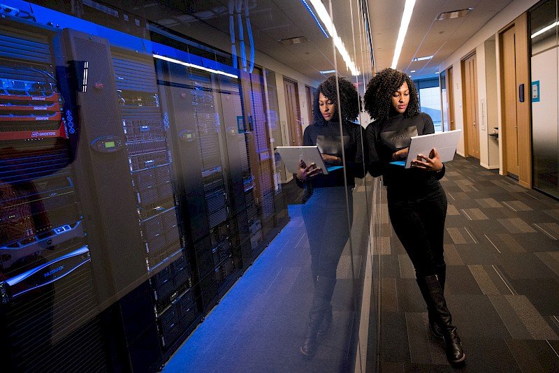 Office Manager focusing on her work not her equipment